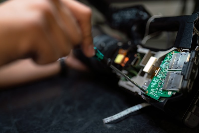 Engineer inspecting automotive components